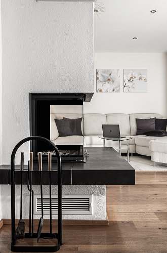 interior white sectional sofa and black table furniture