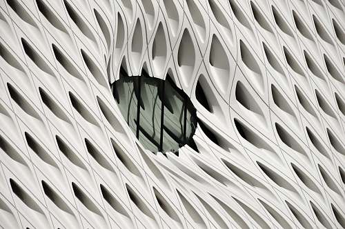 architecture oval black tint glass panel on white surface los angeles