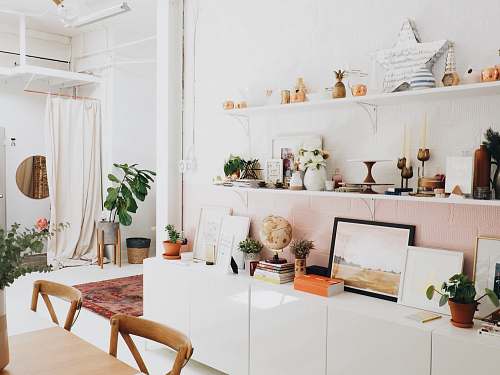 interior white wooden shelf and decors home
