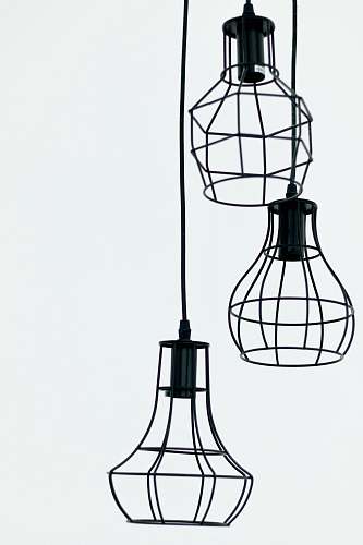 pole three black pendant lamps lamp post