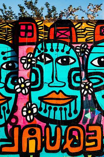 art pink, teal, and orange graffiti wall art wall