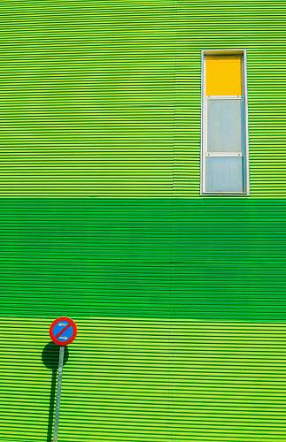 wall green house with road sign window