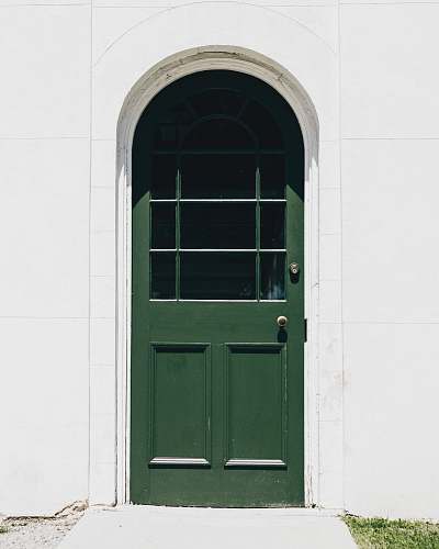 door green wooden storm glass door close doorway