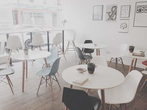chair minimalist photography of white table and chairs resto table