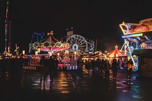person amusement park photo at night hyde park