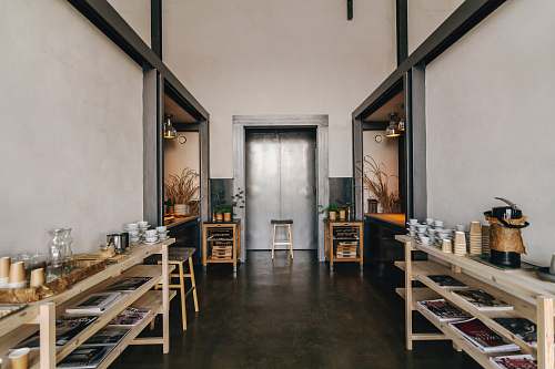 room brown wooden racks on brown concrete flooring coffee