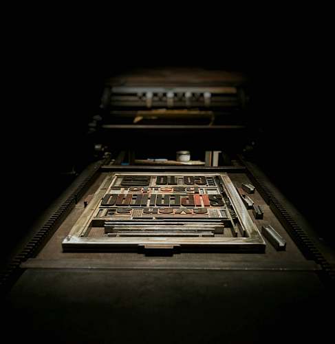 print close up photography of brown wooden decor letterpress