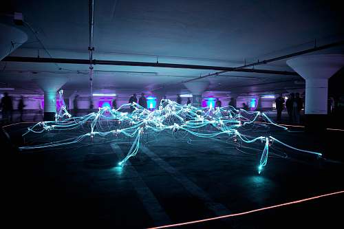 laser linked neon lights under white painted basement electricity