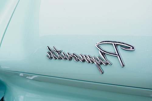 vintage Plymouth emblem car