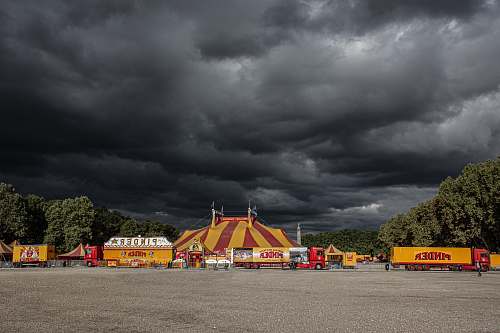 weather circus underneath cumulus clouds urban
