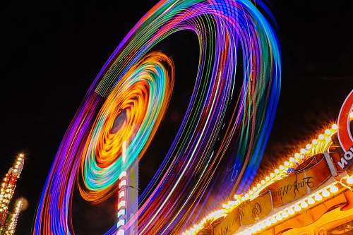 circle time lapse photography of Ferris wheel spin
