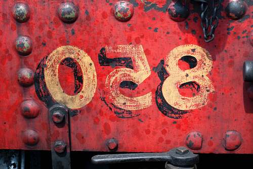 numbers 850-printed on red metal panel united kingdom