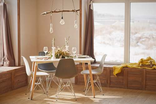 furniture white wooden dining table set during daytime dining room