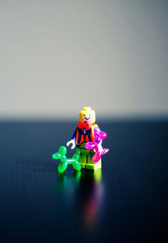 figurine selective photography of Clown minifig toy clown