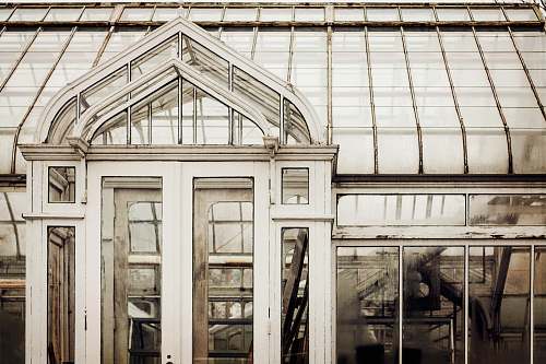 window architectural photography of white steel house architecture