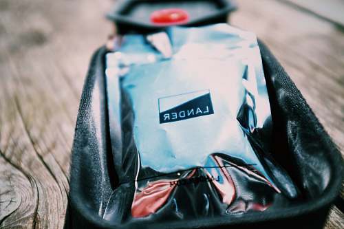 lander tilt shift lens photography of gray sachet brand