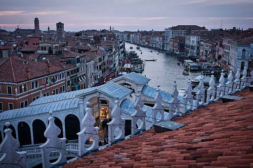 venice white concrete roof of structures during daytime roof
