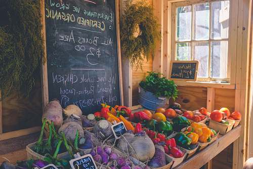 food variety of vegetables display with Certified Organic signage blackboard
