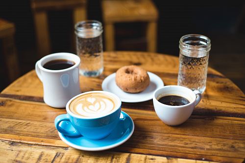 blue teacup with latte form of heart