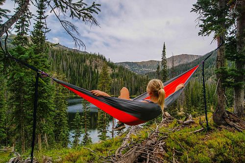 woman on hammock near to river