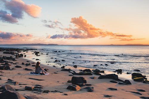 woman sitting seashore