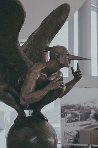 sculpture man with wings statue statue
