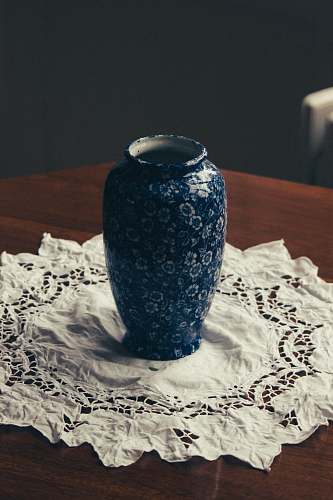 porcelain shallow focus photo of blue and white floral ceramic vase pottery