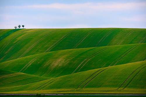 landscape panorama photography of green hills rolling hill