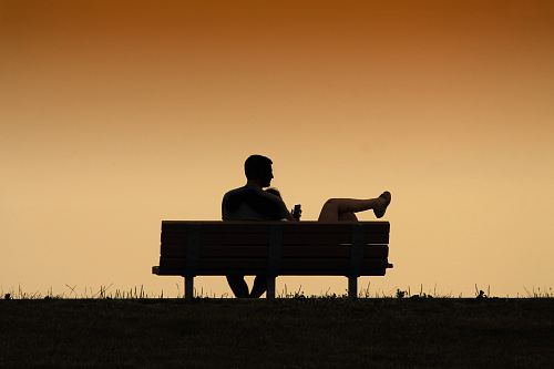 silhouette of couple on the bench painting