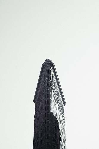 building grayscale photography of flat-iron building new york