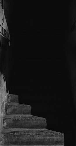 black grayscale photo of concrete stairs staircase