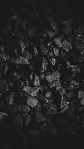 black grayscale photo of stone grey