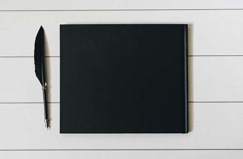 pen black book with pen transportation