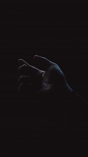 dark left person's palm hand
