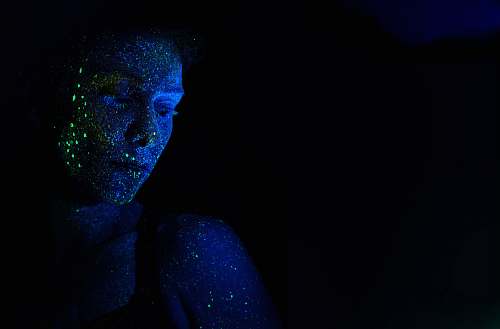 blue photography of woman during nighttime glow