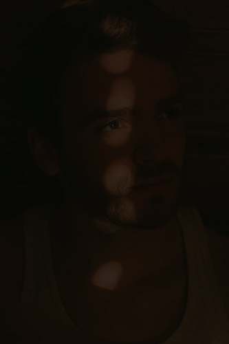 person sun kissed photography of man human