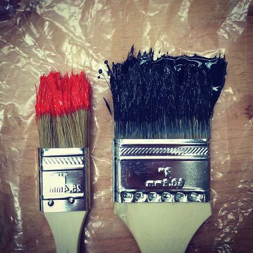 brush two paint brush on tables paint