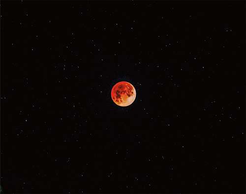 red Luna eclipse during nighttime beige