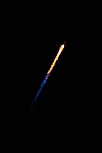 blue rocking flying in sky during night time yellow