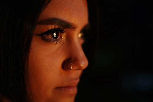 person woman with nose piercing face