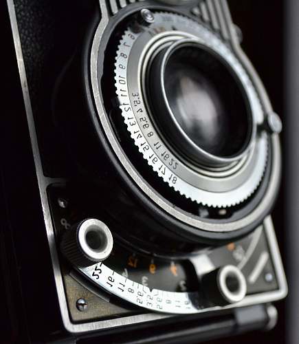 camera close view of black and gray film camera electronics