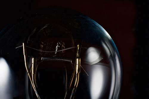 bulb macro photography of electric bulb wire