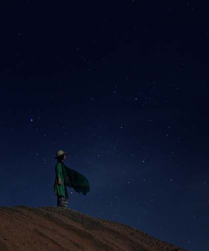 outdoors woman standing on desert night