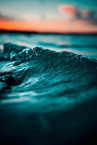 sea selective focus photo of water wave lagoon