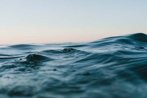 water body of water under sky sea