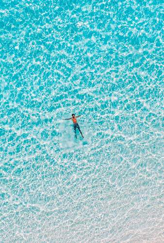 sea bird's eye view of man on body water nature