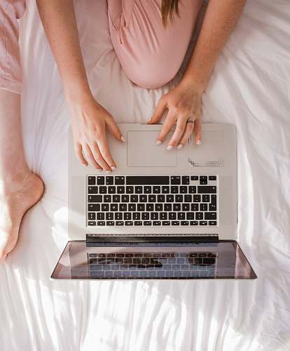 electronics woman using MacBook Pro laptop
