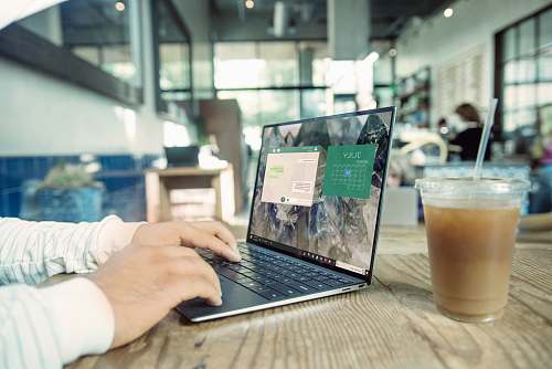 computer person using black laptop computer electronics
