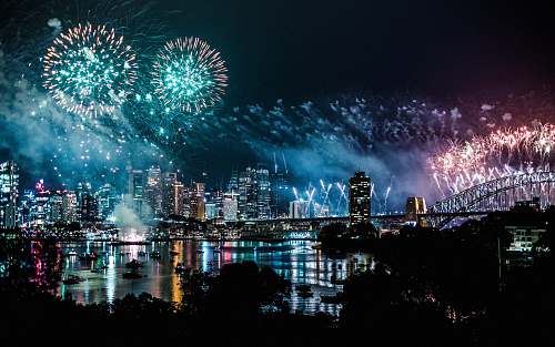 outdoors bird's-eye view photography of fireworks above city nature
