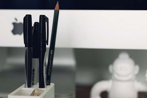 pen pen and pencil in organizer close-up photography fivebox